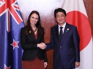 Prime Minister shaking hands with the Prime Minister of New Zealand