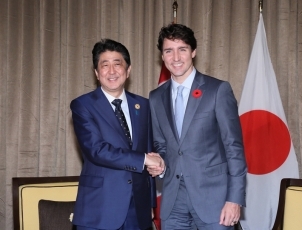 Prime Minister shaking hands with the Prime Minister of Canada