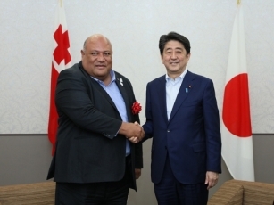 Prime Minister shaking hands with the Deputy Prime Minister and <br>Minister for Infrastructure and Tourism of Tonga
