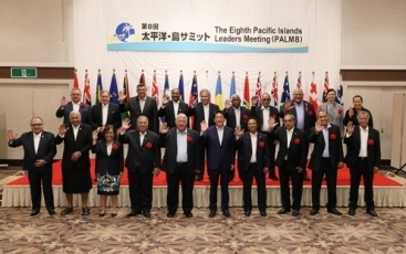 Prime Minister attending a commemorative photograph session