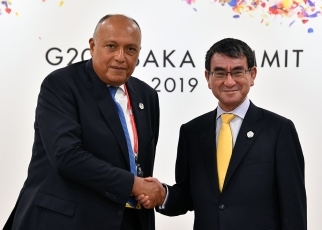 Two Ministers Shaking Hands