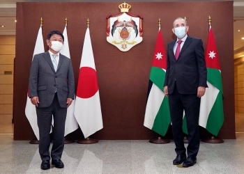 Two ministers taking photos