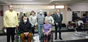 (photo 1) Interaction with Georgia Women's Wheelchair Fencing Players