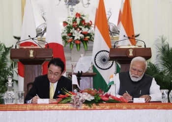 Picture of Singing Celemony on Documents by two leaders