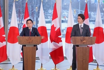 Two leaders who hold a joint press conference standing behind the lectern