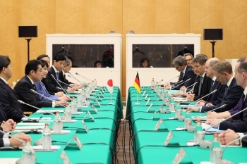 Relevant Ministers from both sides who attend Japan-Germany Inter-Governmental Consultations after having a seat at a table