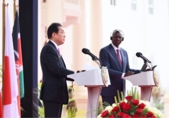 Two leaders who attend a joint press announcement behind the lectern