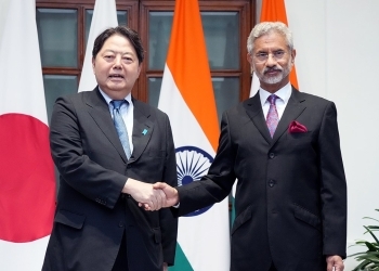 Foreign Minister Hayashi shakes hand with H.E. Dr. S. Jaishankar, Minister of External Affairs of India