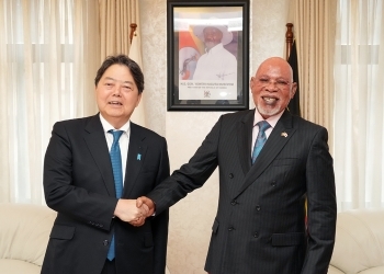 Two ministers shaking hands