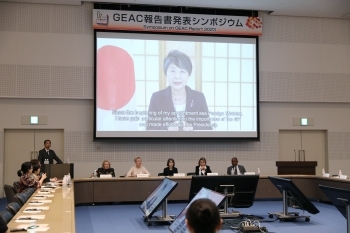 A video message of Minister KAMIKAWA which is broadcasted on a large screen in the hall