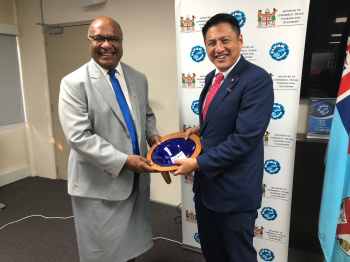 A photo of State Minister Takei with Hon. Manoa KAMIKAMICA, Deputy Prime Minister and Minister for External Trade, Cooperatives, and SMEs of the Republic of Fiji