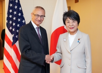 Foreign Minister KAMIKAWA Shaking Hands with the Honorable Podesta, Senior Advisor to the President of the US