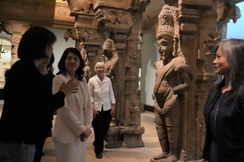 Mrs. Kishida touring a work of art