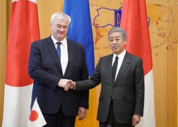 Japan and Ukraine Foreign Ministers shake hands