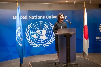 Ms. Ikuina, Parliamentary Vice-Minister for Foreign Affairs is delivering her speech