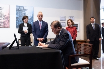 Prime Minister Ishiba Signing a Condolence Book