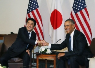 Prime Minister Abe shaking hands with US President Obama