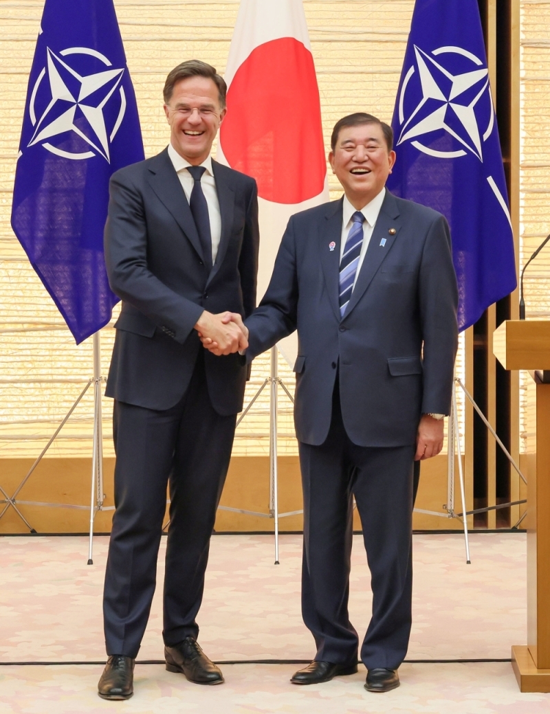 Prime Minister Ishiba shaking hands with Secretary General Rutte