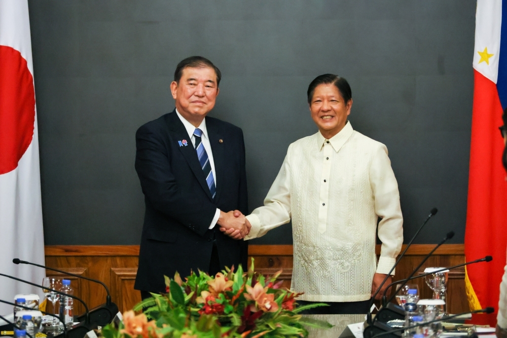 Prime Minsiter Ishiba shaking hands with President Marcos