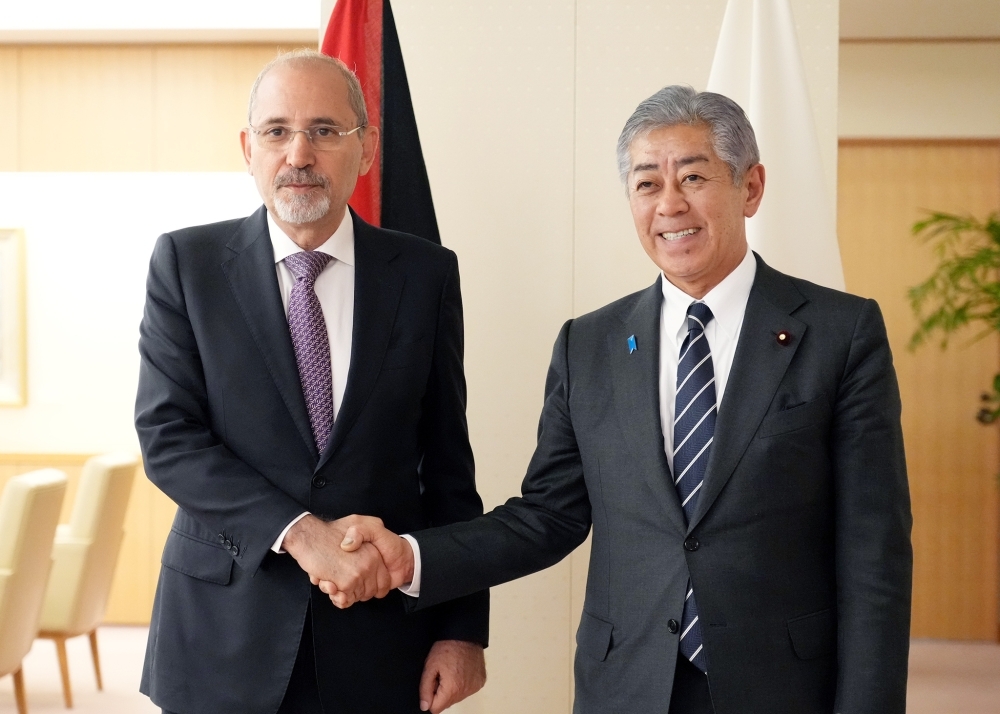 Foreign Minister IWAYA is shaking hands with H.E. Mr. Ayman Al Safadi, Deputy Prime Minister and Minister of Foreign Affairs and Expatriates of Jordan
