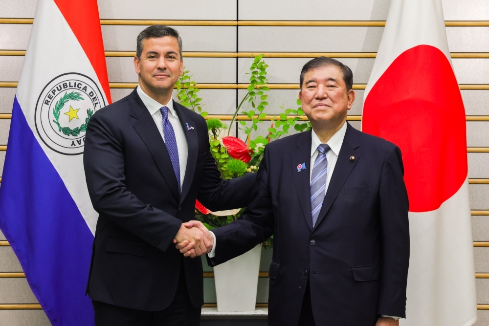 Prime Minister Ishiba shaking hands with President Peña