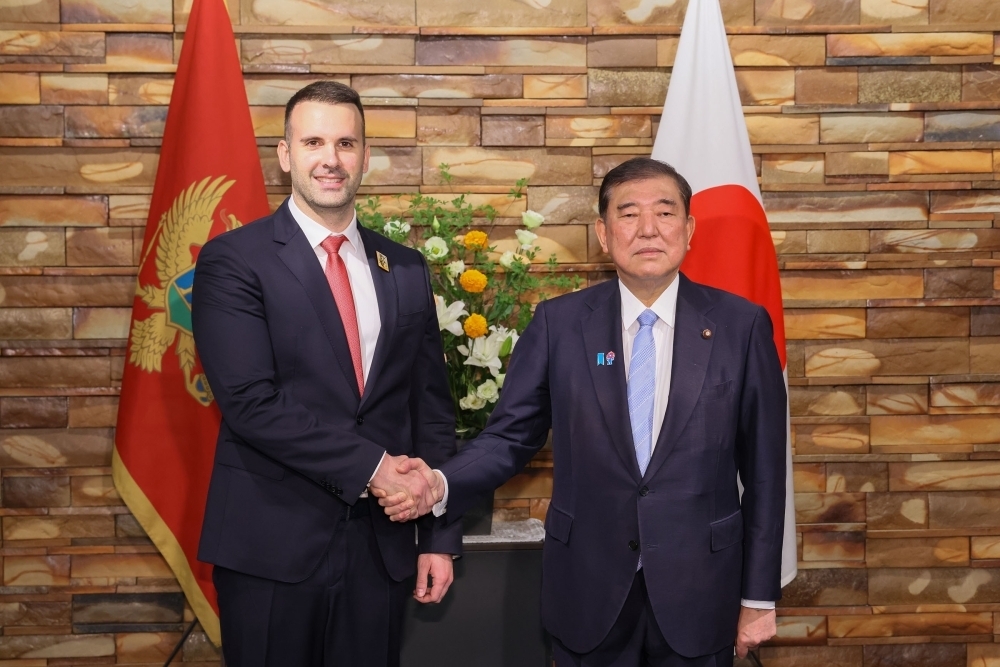 Prime Minister Ishiba is shaking hands with Mr. Milojko Spajić, Prime Minister of Montenegro