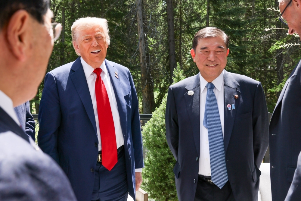 Prime Minister Ishiba is walking with Donald. J. Trump, President of the United States of America