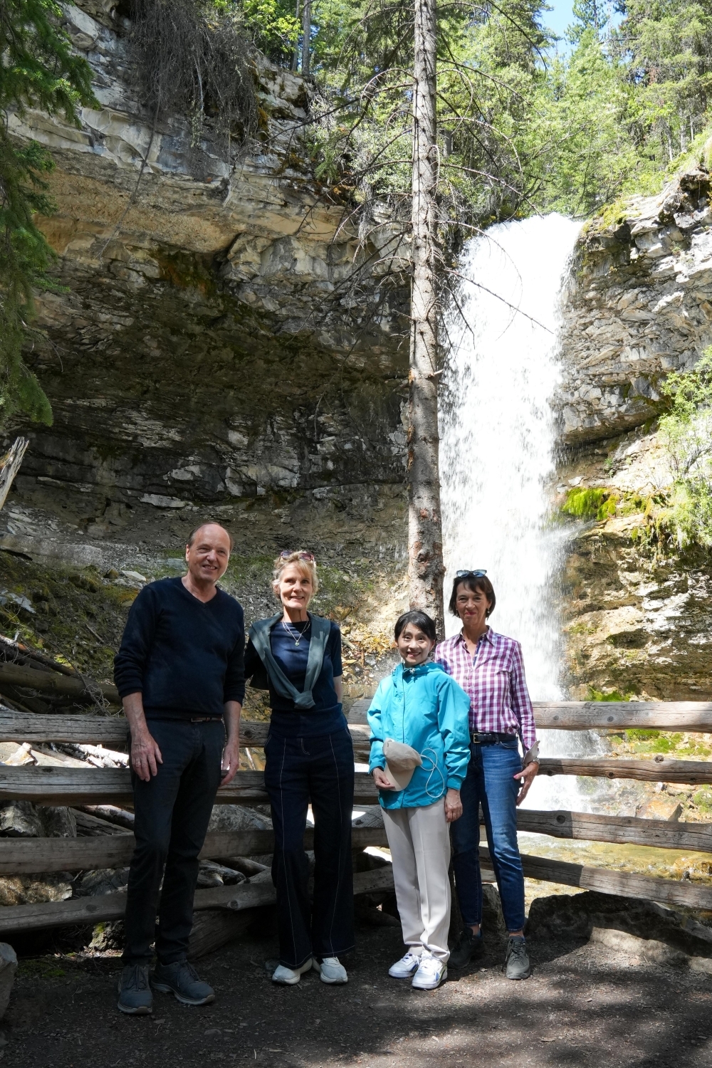 Memorial photo in front of ”Troll Falls Trail