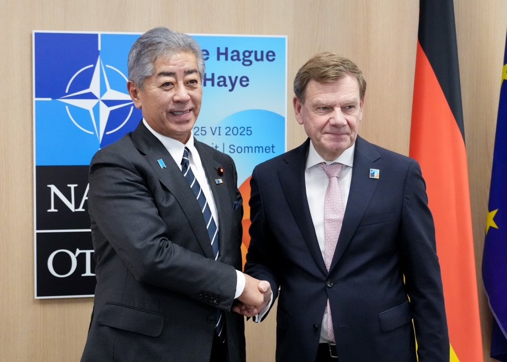Two ministers shaking hands