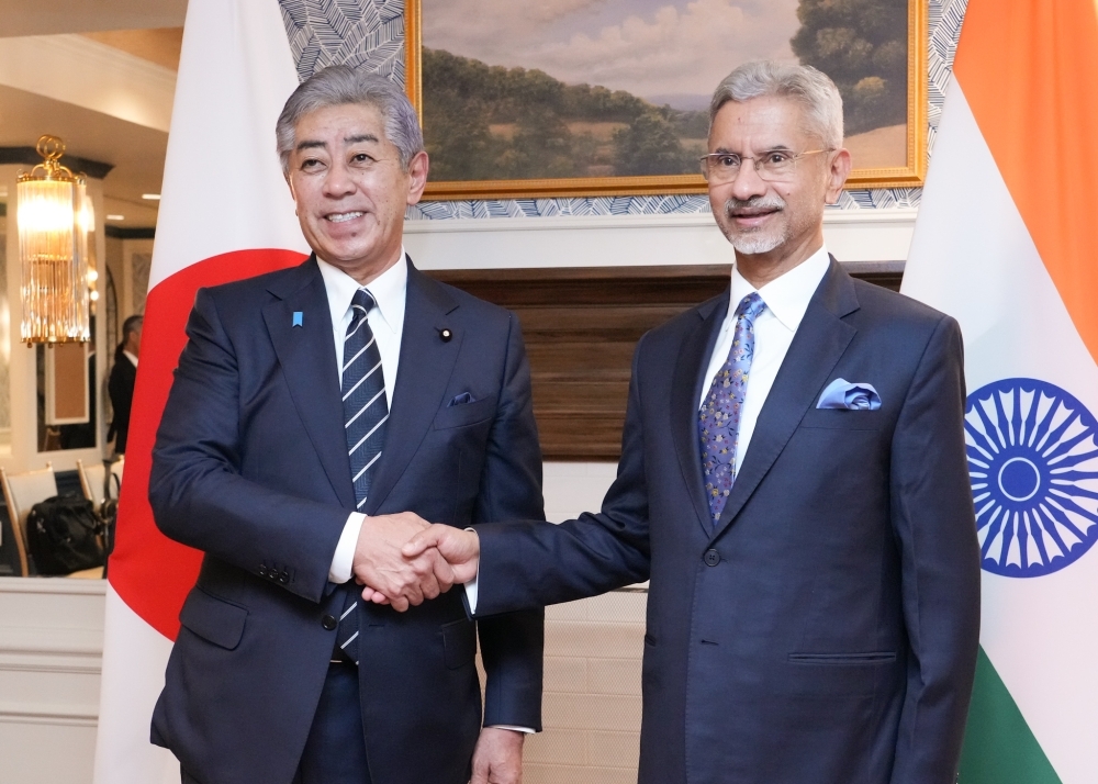 Minister Iwaya shaking hands with Minister Jaishankar