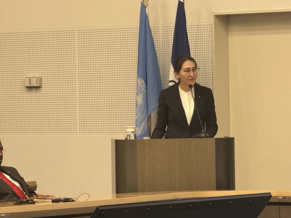 Parliamentary Vice Minister ERI giving a greeting at the symposium