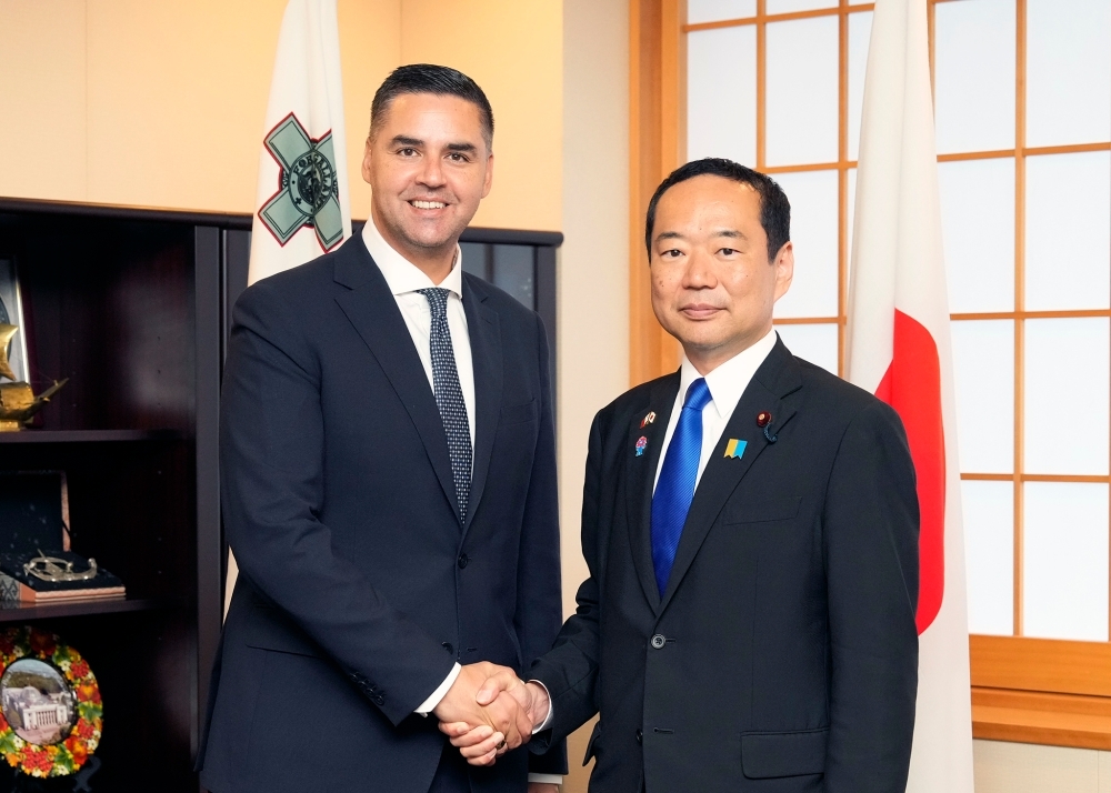 State Minister for Foreign Affairs Fujii shakes hands with Deputy Prime Minister Borg