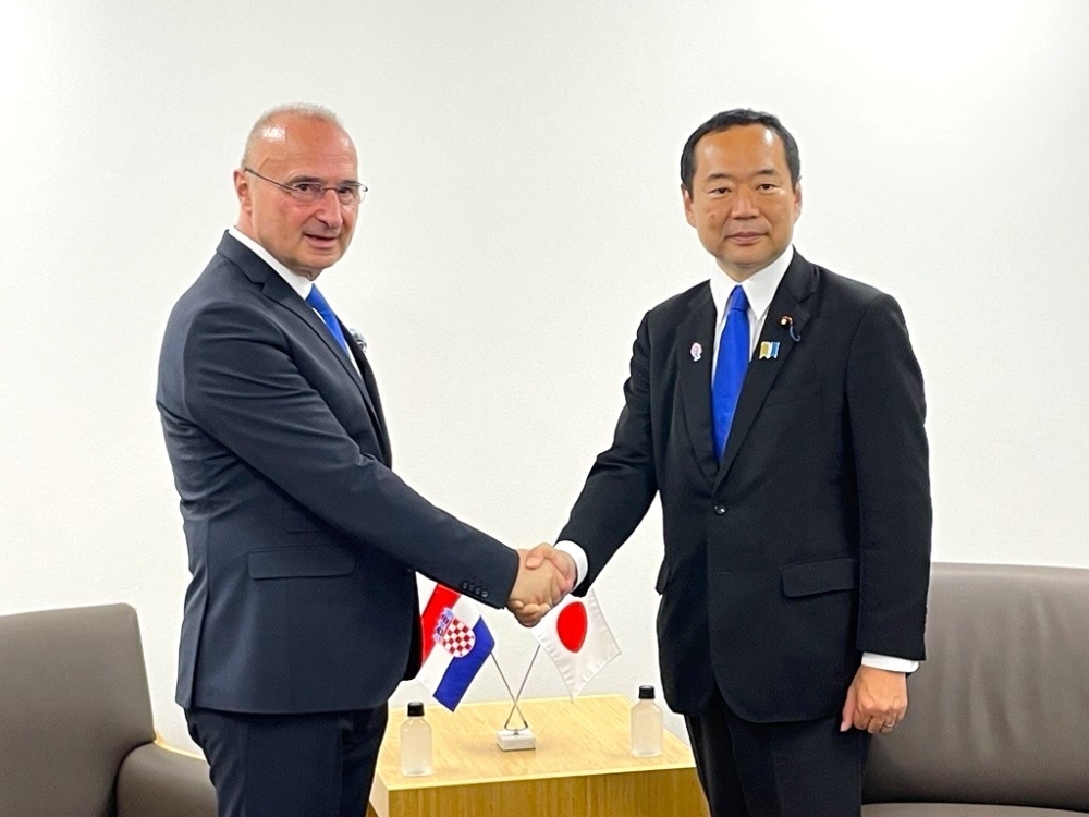 State Minister Fujii shaking hands with Minister Grlić Radman