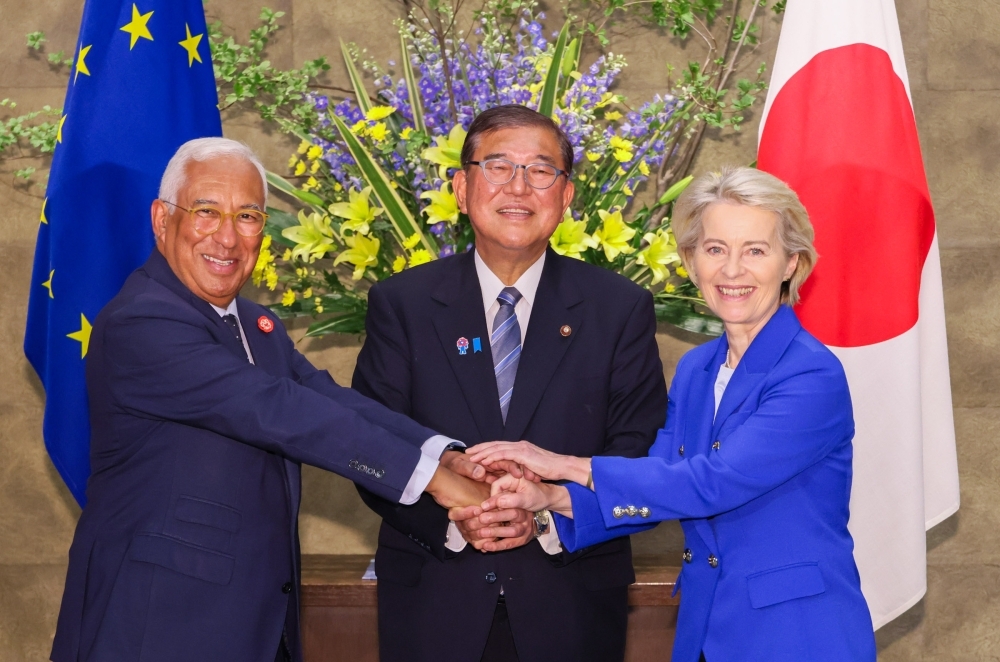 Prime Minister Ishiba shaking hands with President Costa and President von der Leyen
