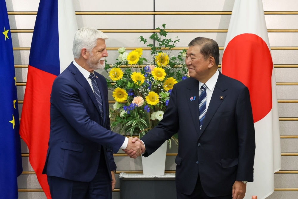 Prime Minister Ishiba is shaking hands wtih H.E. Mr. Petr PAVEL, President of the Czech Republic