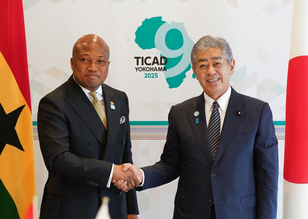 Minister IWAYA shaking hands with Minister Ablakwa