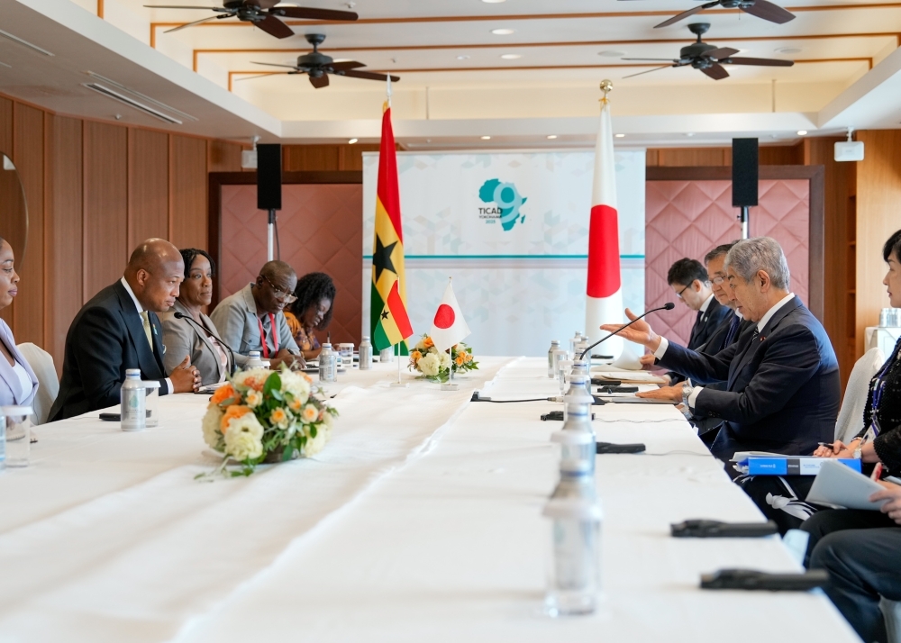 Minister IWAYA talking with Minister Ablakwa at the meeting