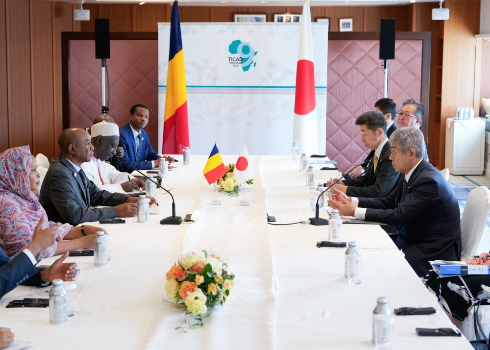 Minister IWAYA talking with Minister Alhabo at the meeting