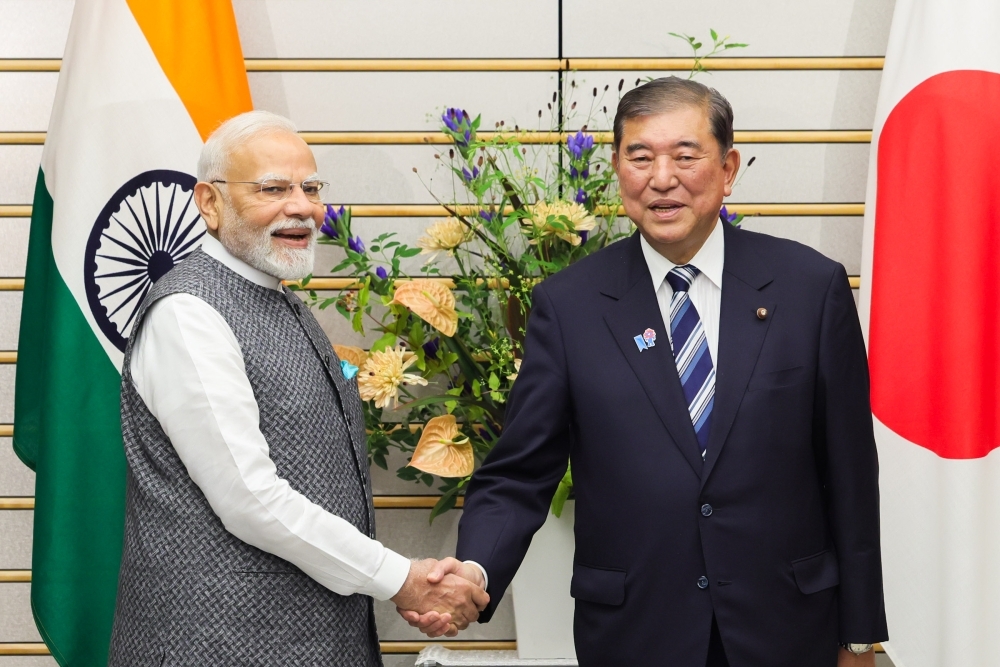 Prime Minister ISHIBA shaking hands with Prime Minister Modi of India