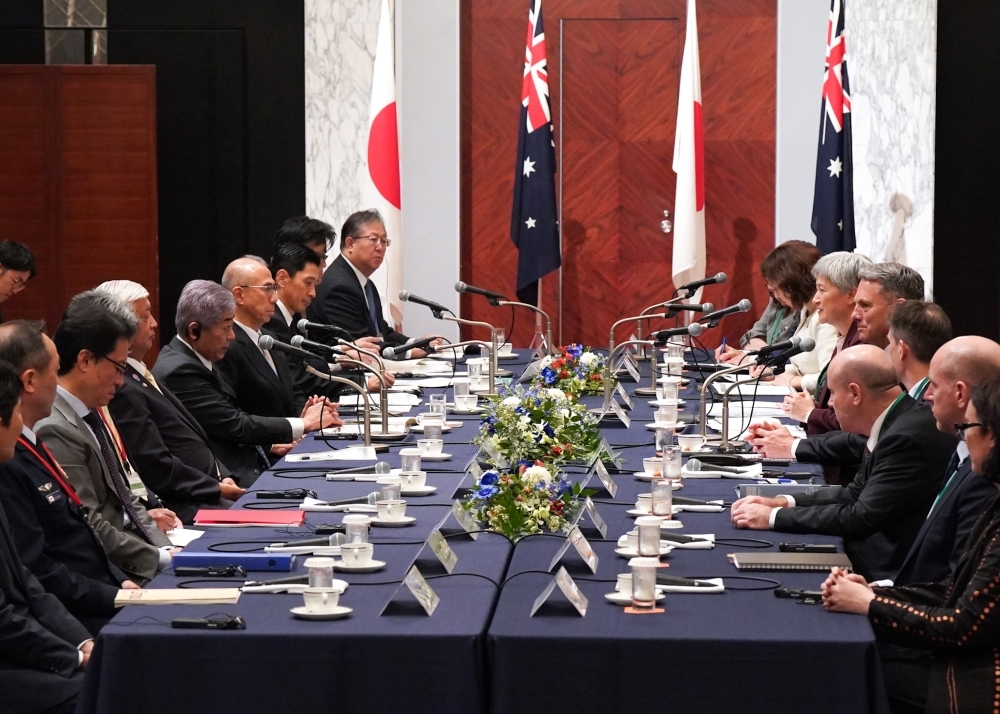 Minister IWAYA and Minister NAKATANI talking with the Hon. Richard Marles MP, Deputy Prime Minister and Minister for Defence of the Commonwealth of Australia and Senator the Hon. Penny Wong, Minister for Foreign Affairs of the Commonwealth of Australia in Tokyo