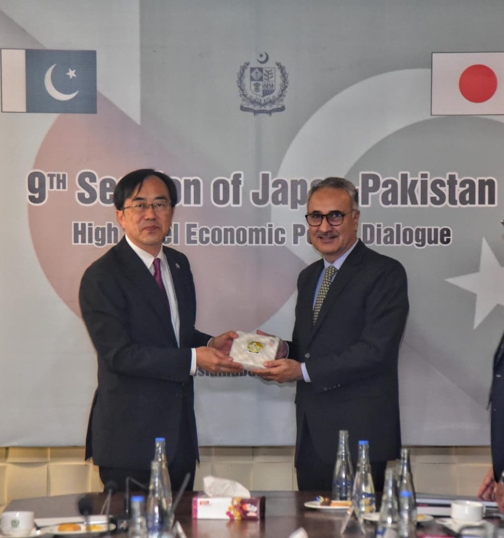 Mr. Akahori, Senior Deputy Minister for Foreign Affairs of Japan and H.E. Dr. Kazim Niaz, Secretary to the Government of the Islamic Republic of Pakistan, Ministry of Economic Affairs
