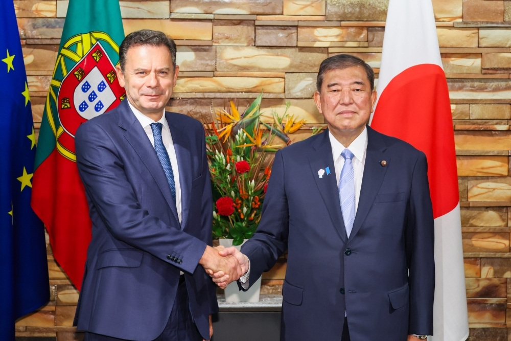 Prime Minister ISHIBA shaking hands with H.E. Mr. Luís MONTENEGRO, Prime Minister of the Portuguese Republic