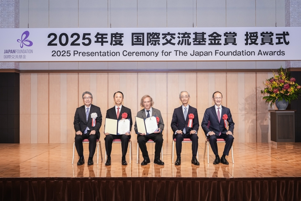 Award recipients on the stage