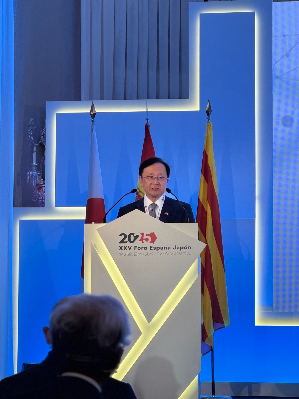 Mr. SATO making a speech on the stage