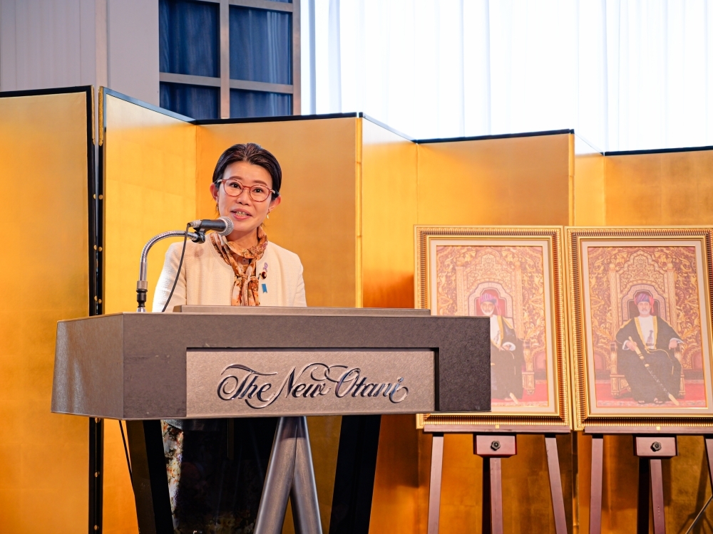 State Minister KUNIMITSU delivering his remarks in front of the participants