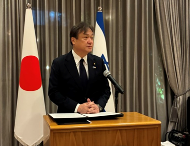 State Minister HORII Horii delivering a speech at the memorial event following the shooting in Sydney