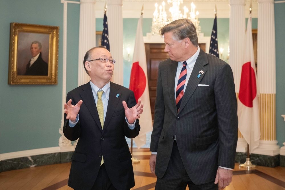 Vice Minister FUNAKOSHI talkning with the Honorable Christopher Landau, Deputy Secretary of State of the United States of America