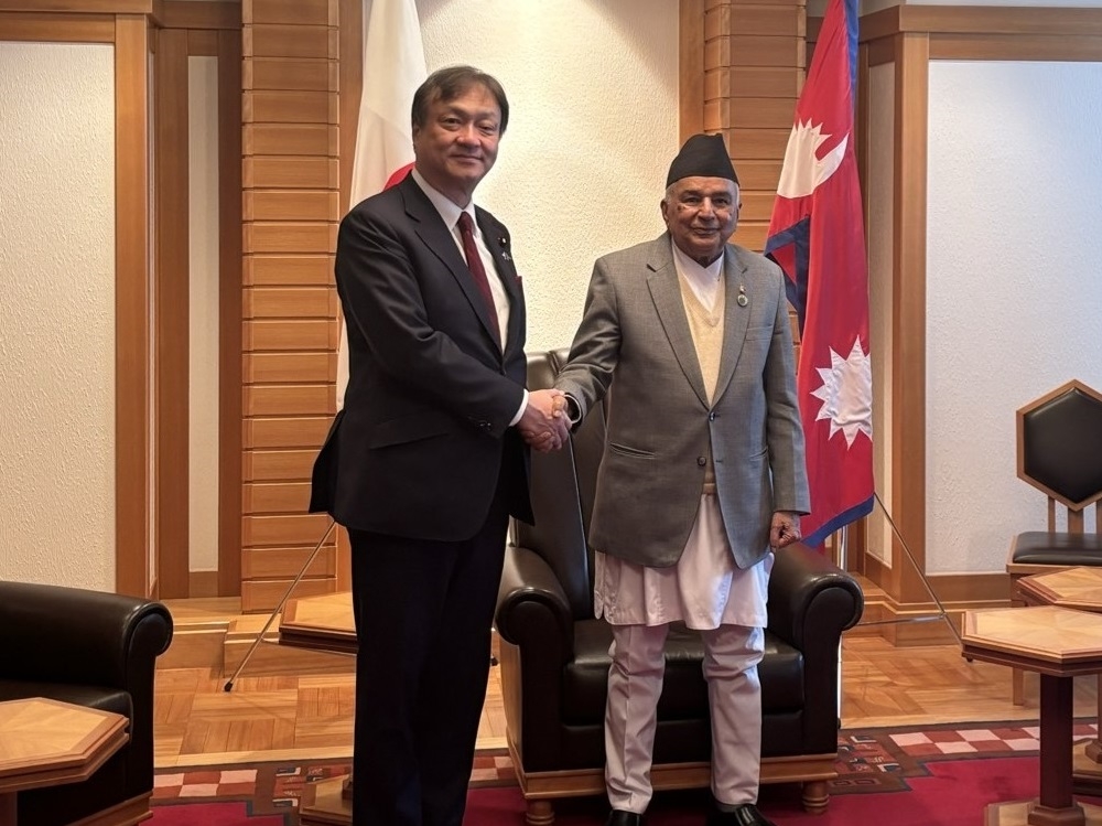 State Minister HORII shaking hands with Mr. Paudel, President of Nepal