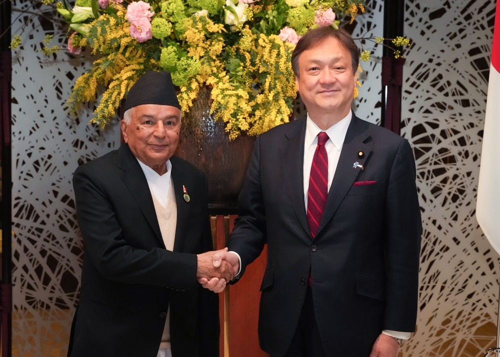 State Minister HORII shaking hands with Rt. Hon. Mr. Ramchandra Paudel, President of Nepal
