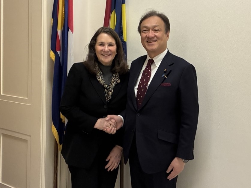 State Minister HORII shaking hands with Representative Degette